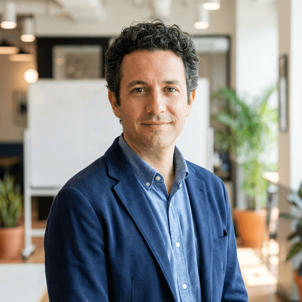 Roberto Alves, retail owner checking real-time payment reports